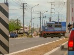 Ferromex C30-S7 Locomotive crossing the street